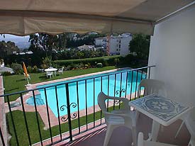 Terrace at No 8 overlooks the pool at La Fuente
