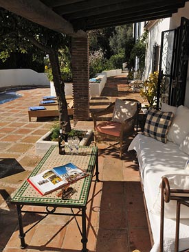 Relax in the shade by the pool at Los Gemelos holiday villa, Mijas