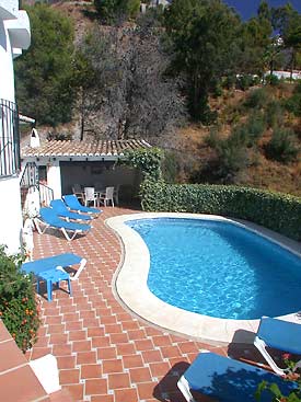 Pool and terrace at Villa Cornisa